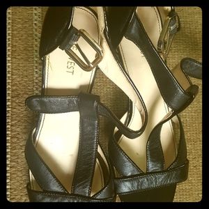 Nine West open toes black sandals.